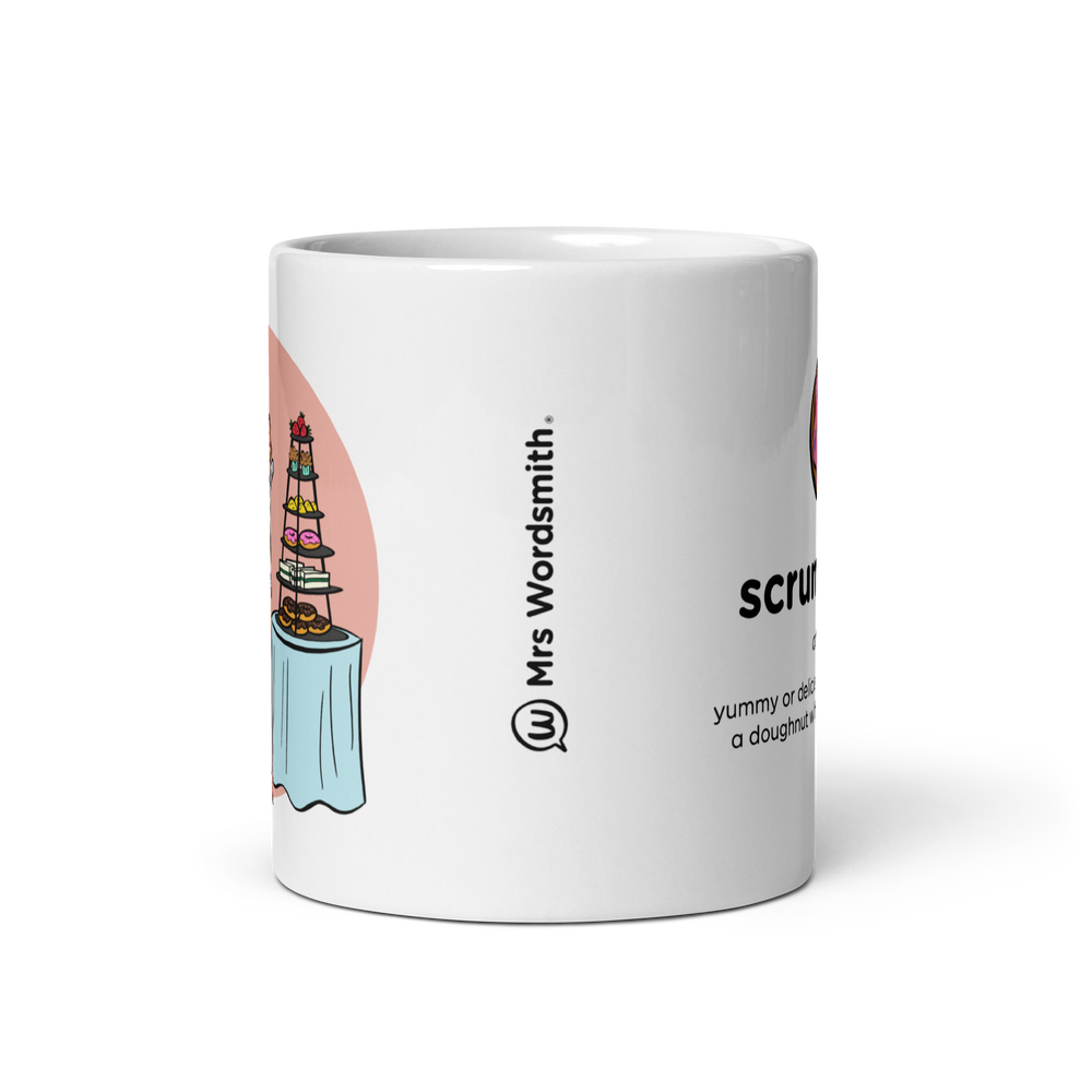 White glossy 11oz mug with Mrs. Wordsmith design, front view.