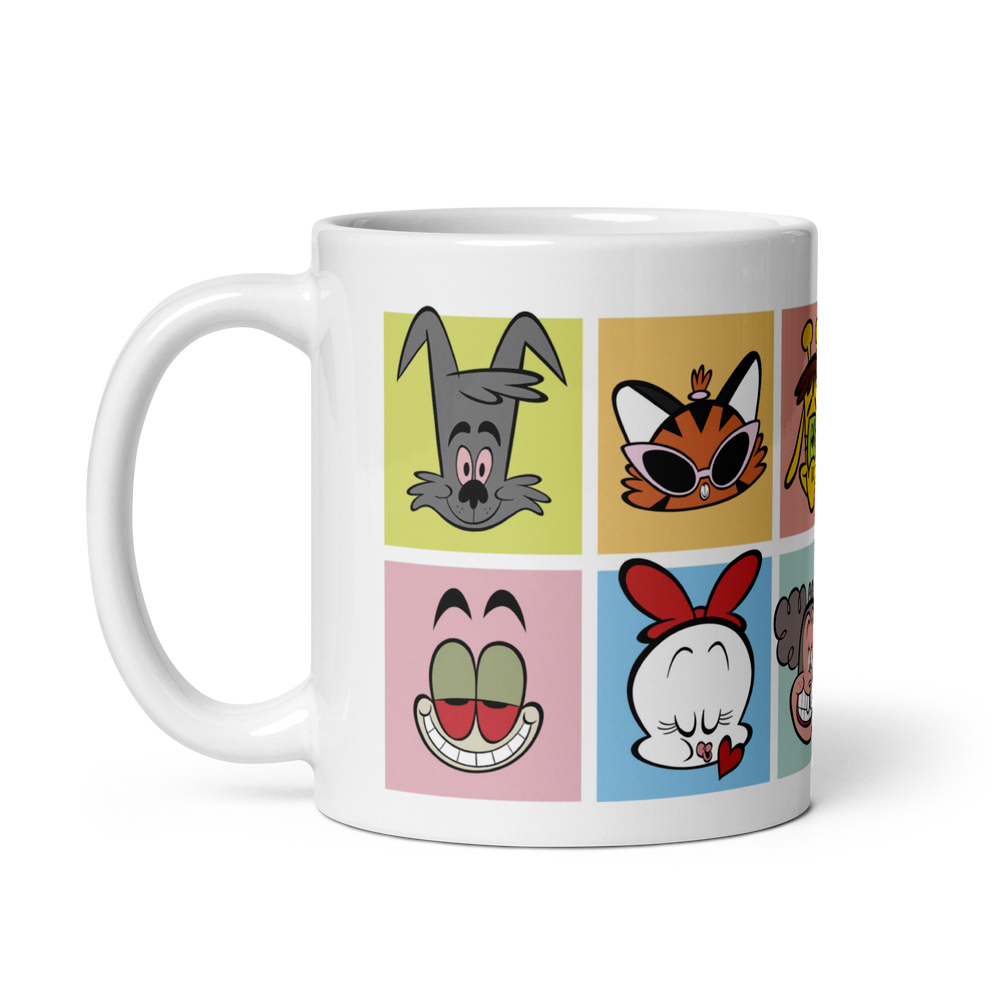 White glossy mug with cartoon character faces, 11 oz, handle on left.
