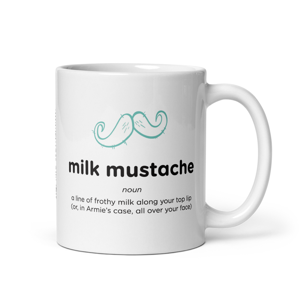 White glossy mug with milk mustache design, handle on right.