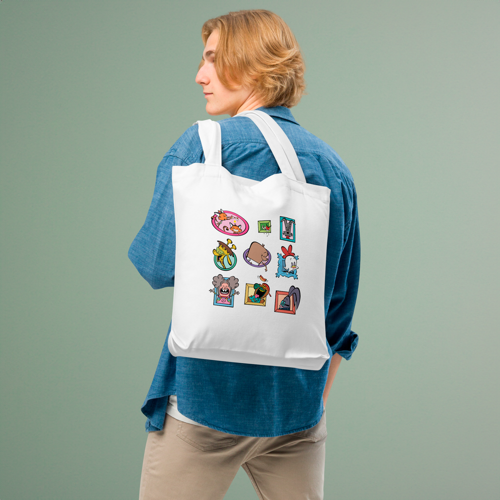 Character cotton tote bag held by person