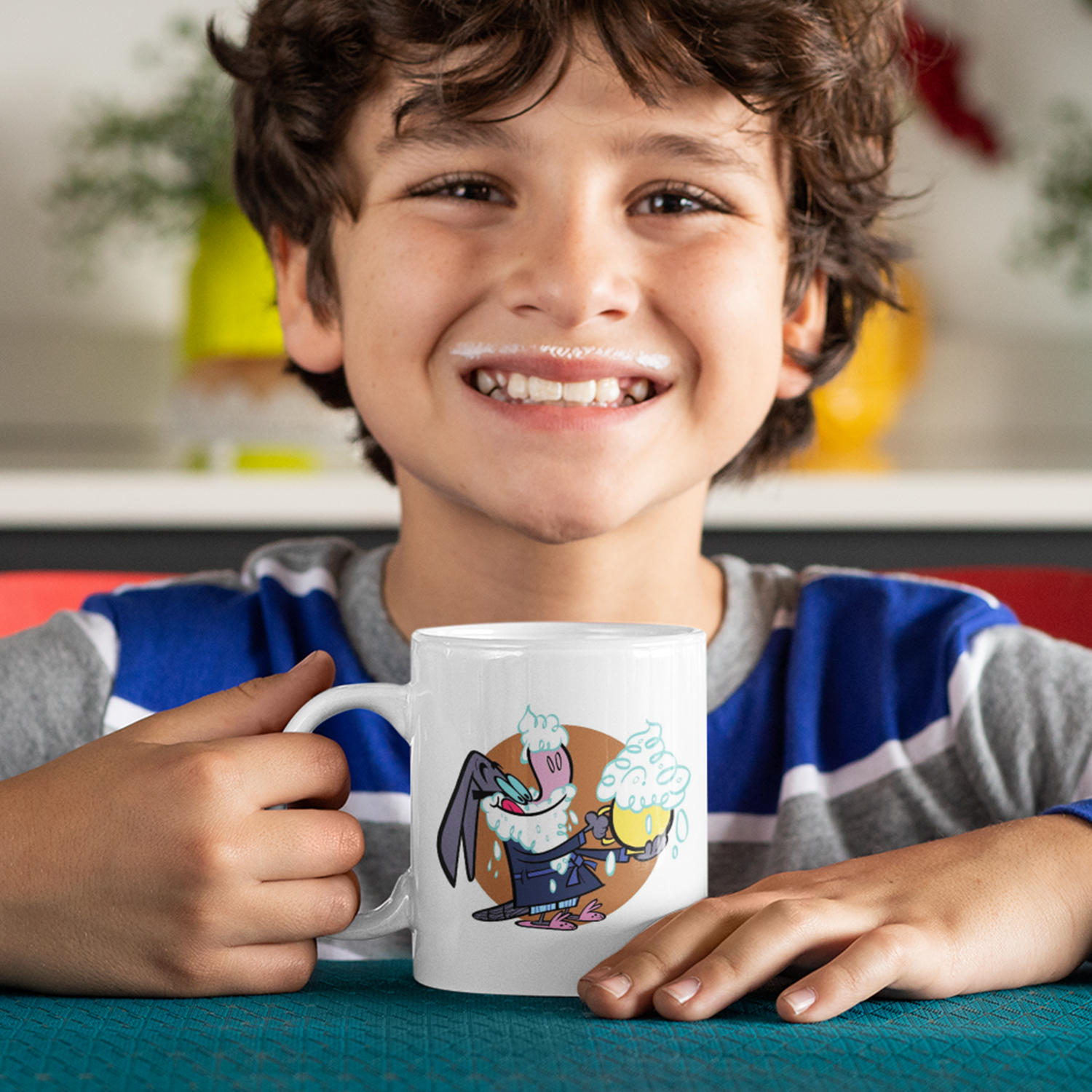 Boy with milk mustache holding mug with cartoon bunny.