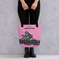 Black 15x15 determined all-over print tote bag front view.