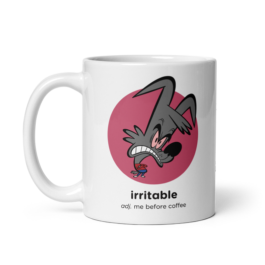 White glossy mug with irritable cartoon design, handle on left